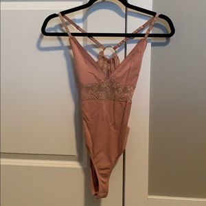 Revamped body suit open back! BNWT XS